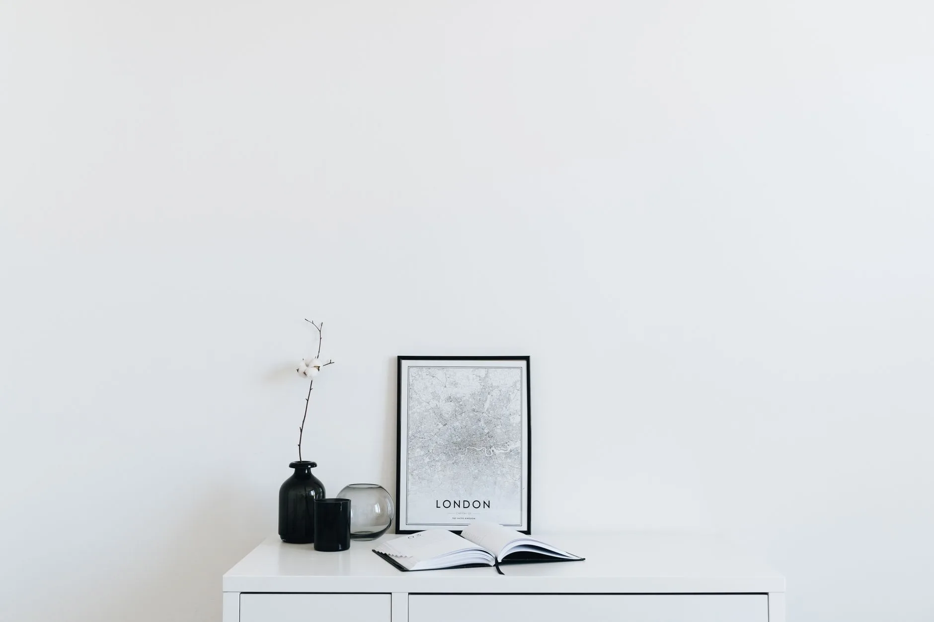 A minimal, curated shelf styled with considered objects