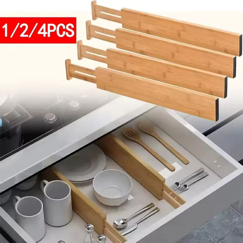 Bamboo drawer dividers organising folded clothes